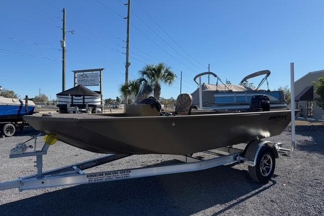 2026 Smoker Craft Pro Sportsman 1660 boat on trailer, outdoor display.