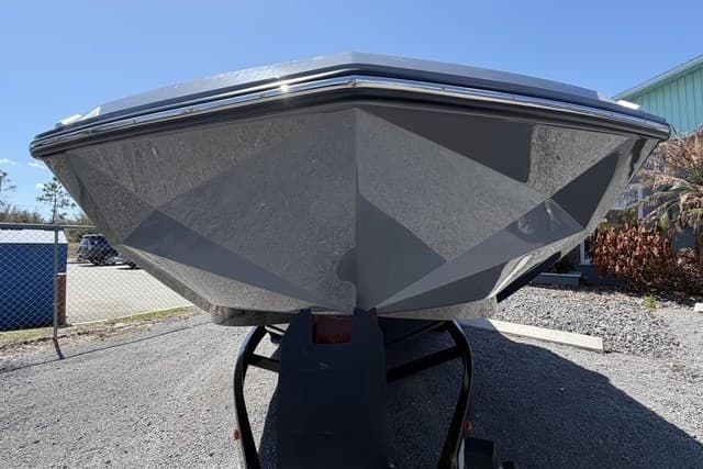 2022 Nautique Super Air Nautique G25 boat front view, parked on a trailer.