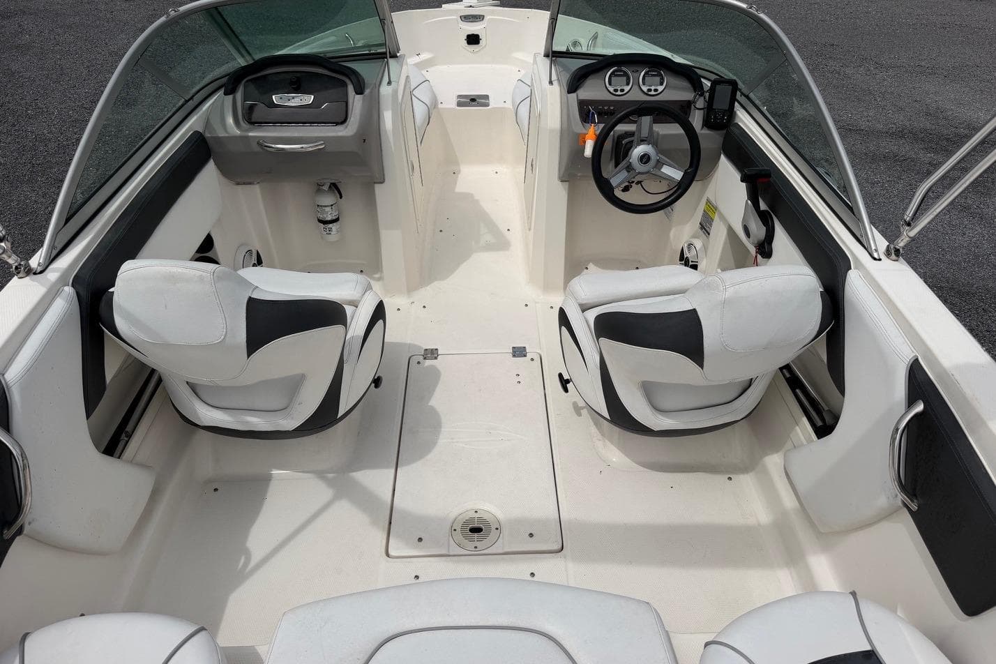 2020 Chaparral 196 SSi boat interior with dual seats and steering console.