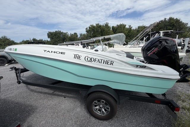 2025 Tahoe T18 boat named "The Codfather" on a trailer, featuring a sleek design.