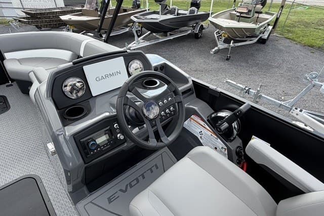 Cockpit of 2027 Evotti 523CS boat with Garmin navigation system and modern controls.