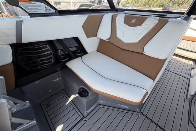 Interior seating of 2022 Nautique Super Air Nautique G25 boat, featuring modern design and comfort.