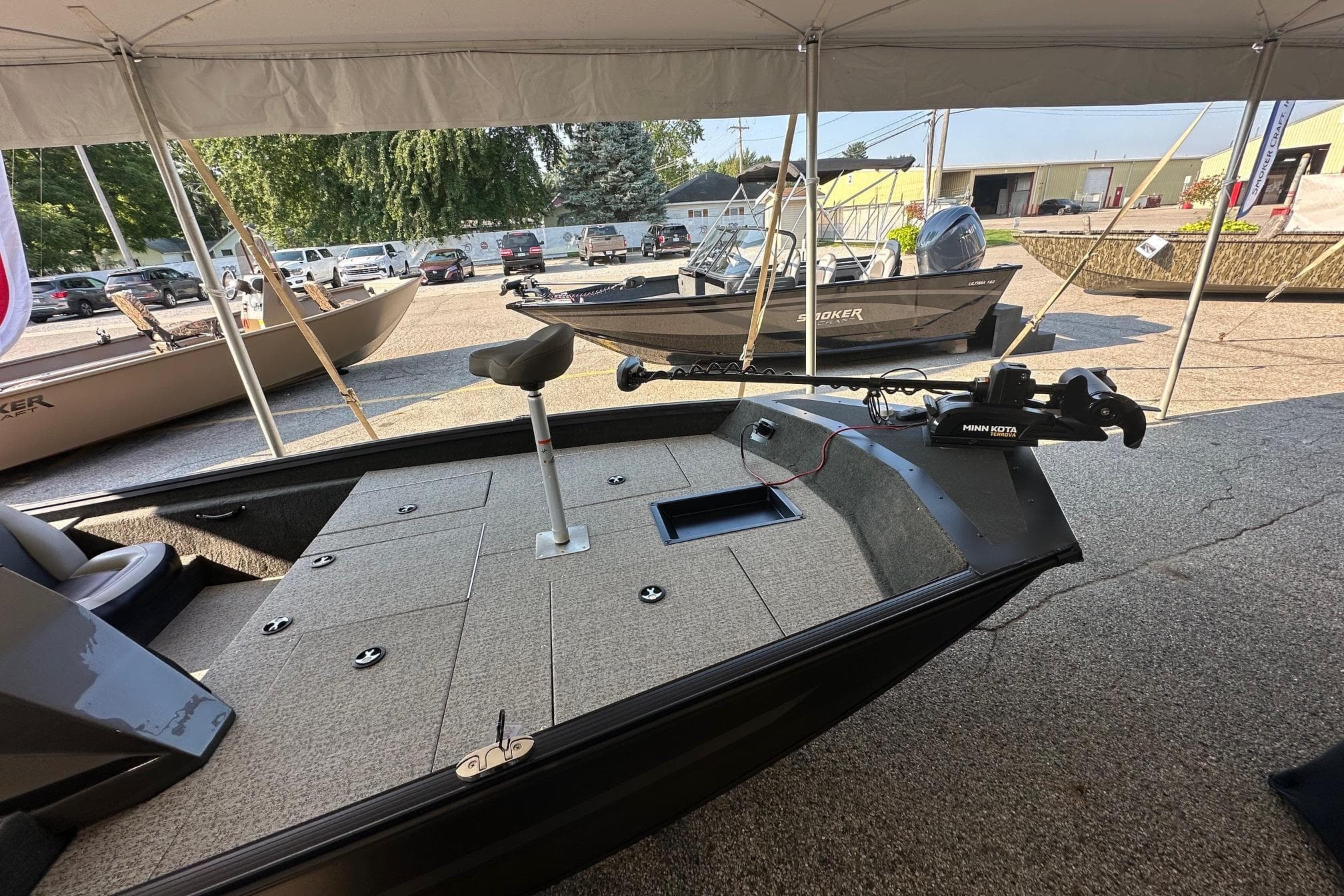 2026 Smoker Craft VIPER 175 boat with Minn Kota trolling motor displayed outdoors.