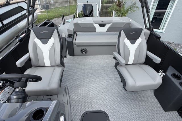 Interior of 2027 Evotti 523CS boat with modern seating and sleek design.