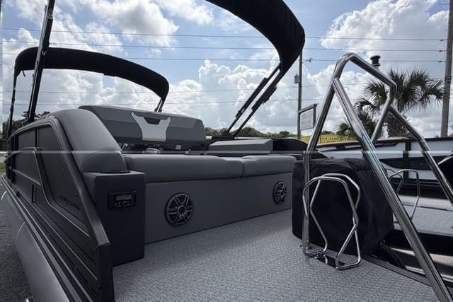 Luxury Evotti 523CS pontoon boat, 2027 model, featuring sleek seating and modern design.