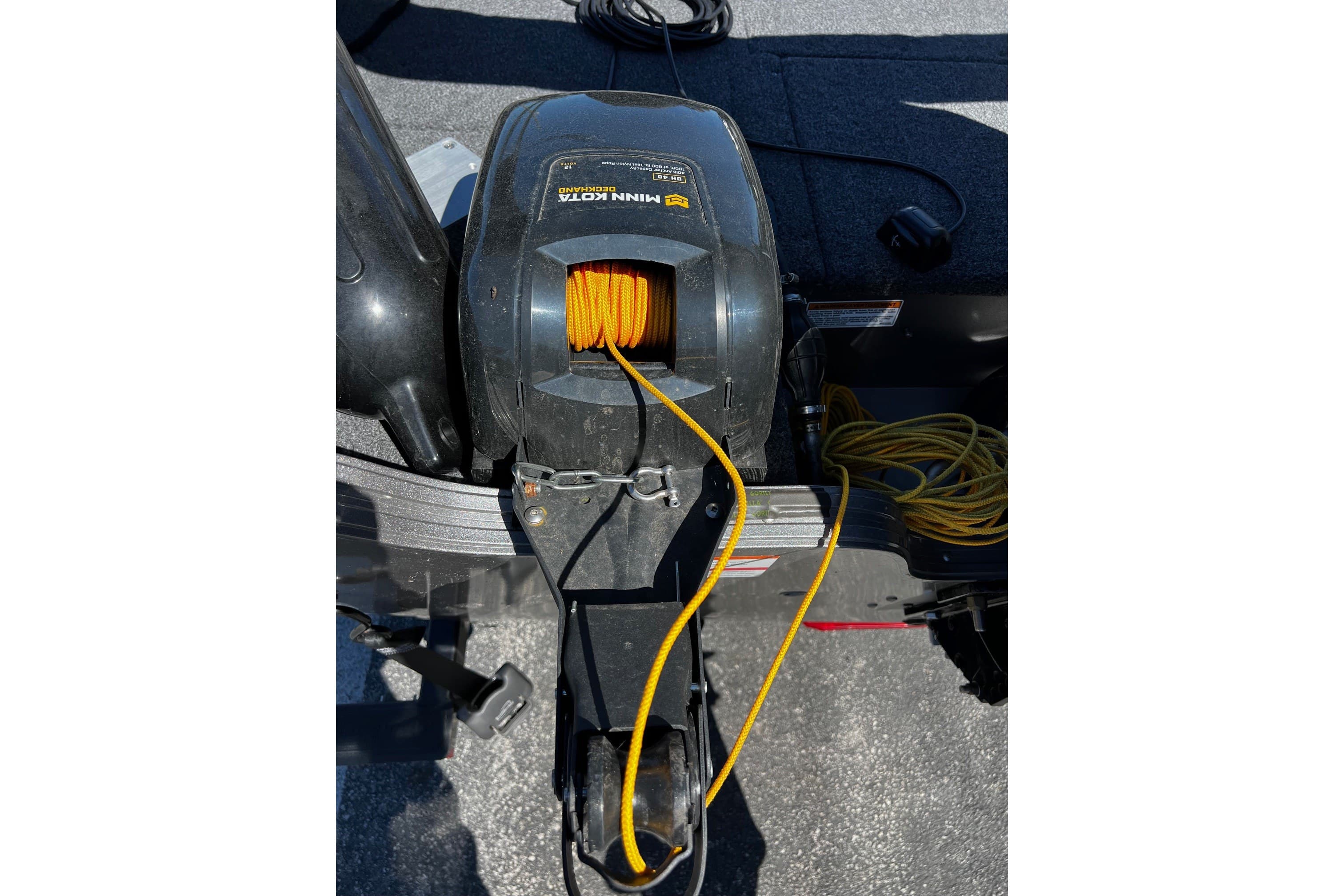 2023 Crestliner 1600 Vision boat with Minn Kota trolling motor and yellow rope.