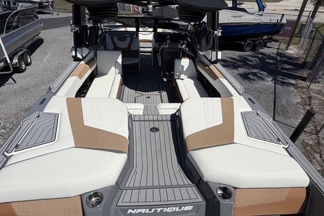 2022 Nautique Super Air Nautique G25 boat interior with luxurious seating and modern design.